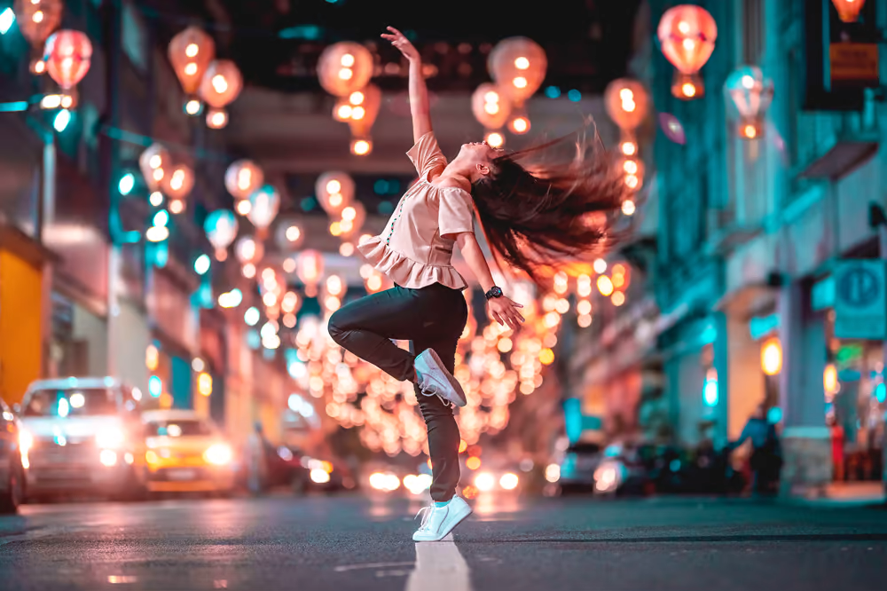photo of girl dancing in street
