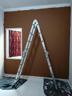 A ladder leaning against a wall

Description automatically generated with medium confidence