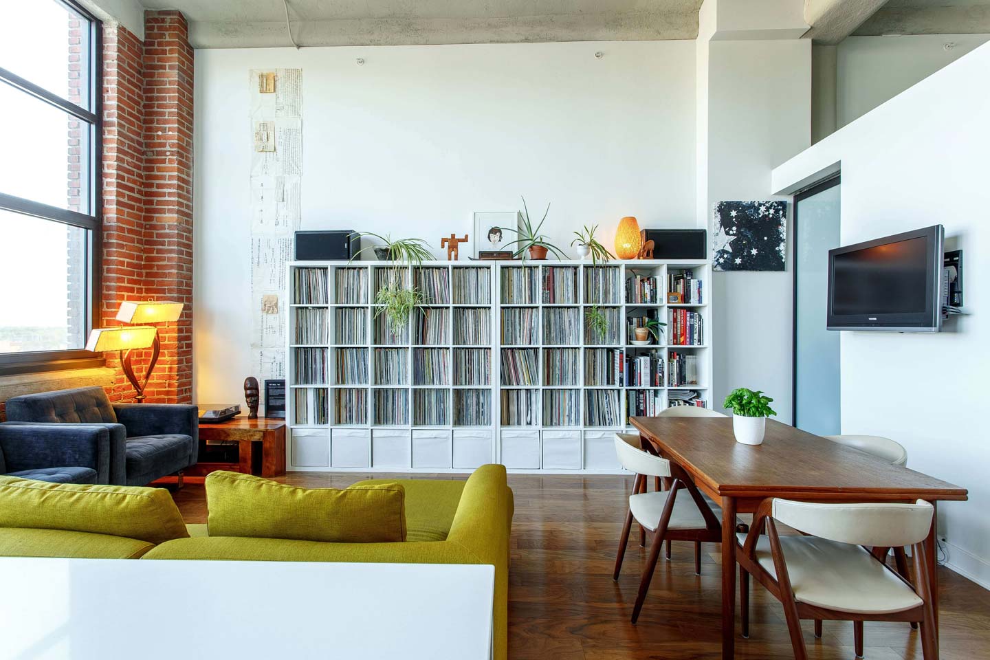 A modern living room with a record collection
