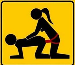 Sign with a woman pegging a man