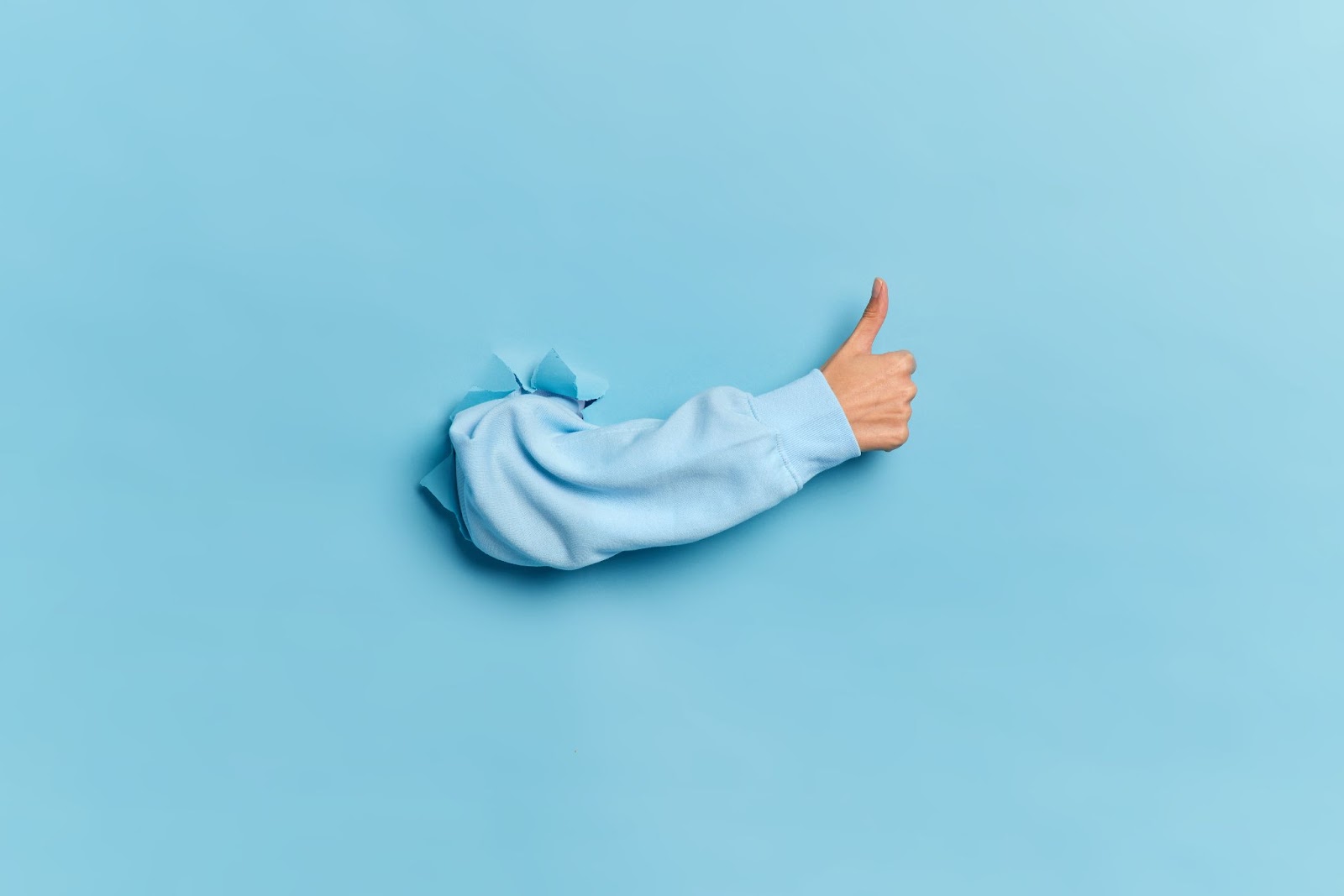 man-arm-okay-sign