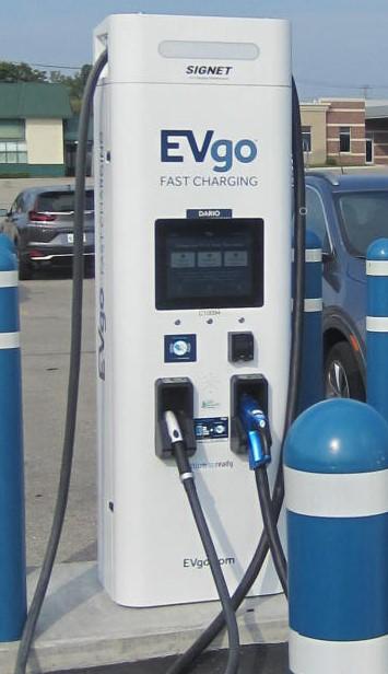 A picture containing text, gas pump

Description automatically generated