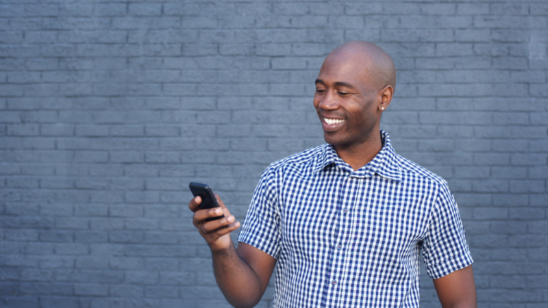 image of man on phone