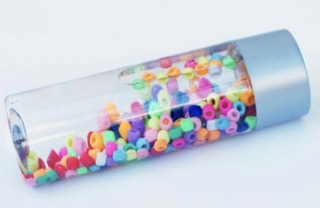 Musical sensory bottle with colored beads