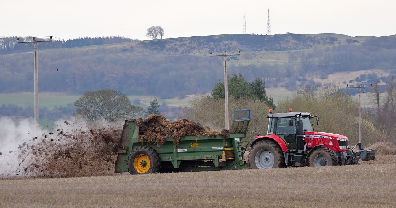 tractor with muck spreading trailer