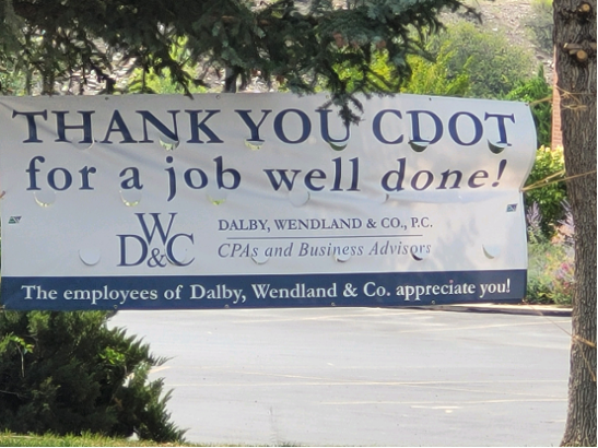 Thank you banner for CDOT workers working on mudslide cleanup