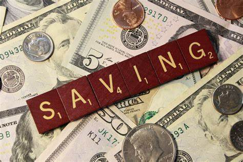 The image with a "saving" word on it.
Source: https://www.photos-public-domain.com/wp-content/uploads/2018/03/saving-money.jpg