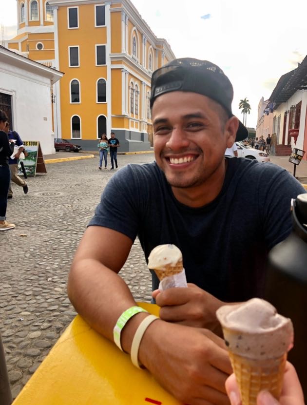 Nicaraguan man smiling and holding ice cream in Granada