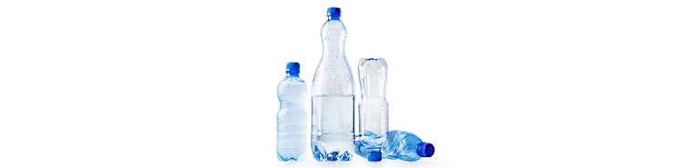 image of four plastic water bottles