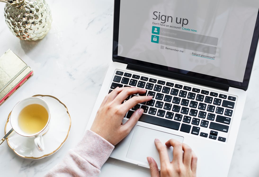 Woman's Hand on Laptop