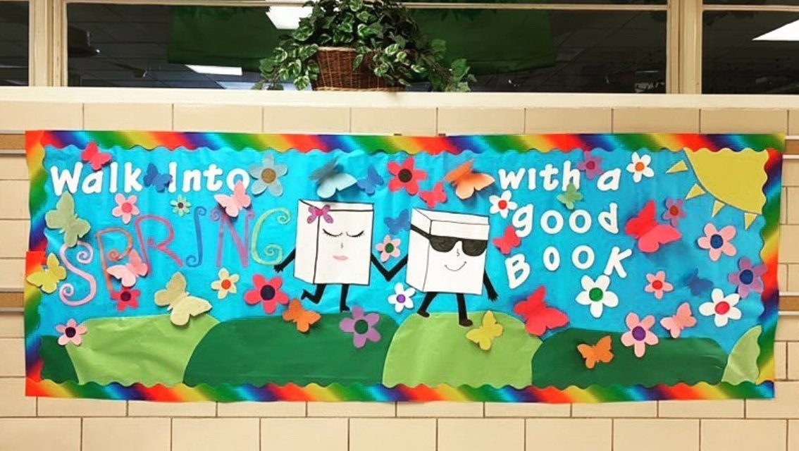 a walk into spring with a good book bulletin board