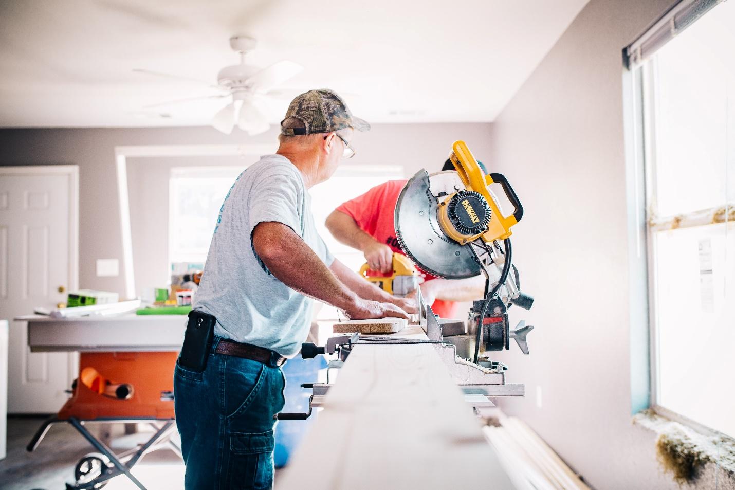 Two people working on a home improvement project