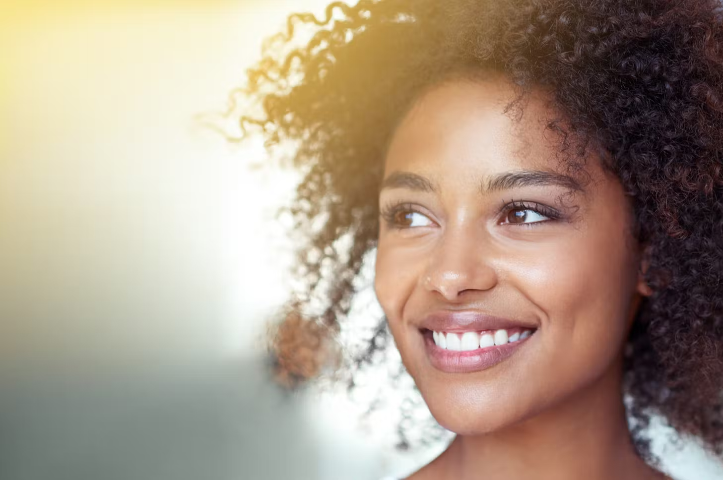 Picture of a lady showing her beautiful smile