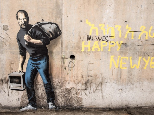 Banksy uses Steve Jobs artwork to highlight refugee crisis | Banksy | The  Guardian