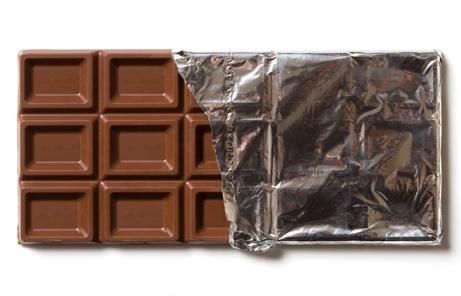 A chocolate bar with a wrapper

Description automatically generated
