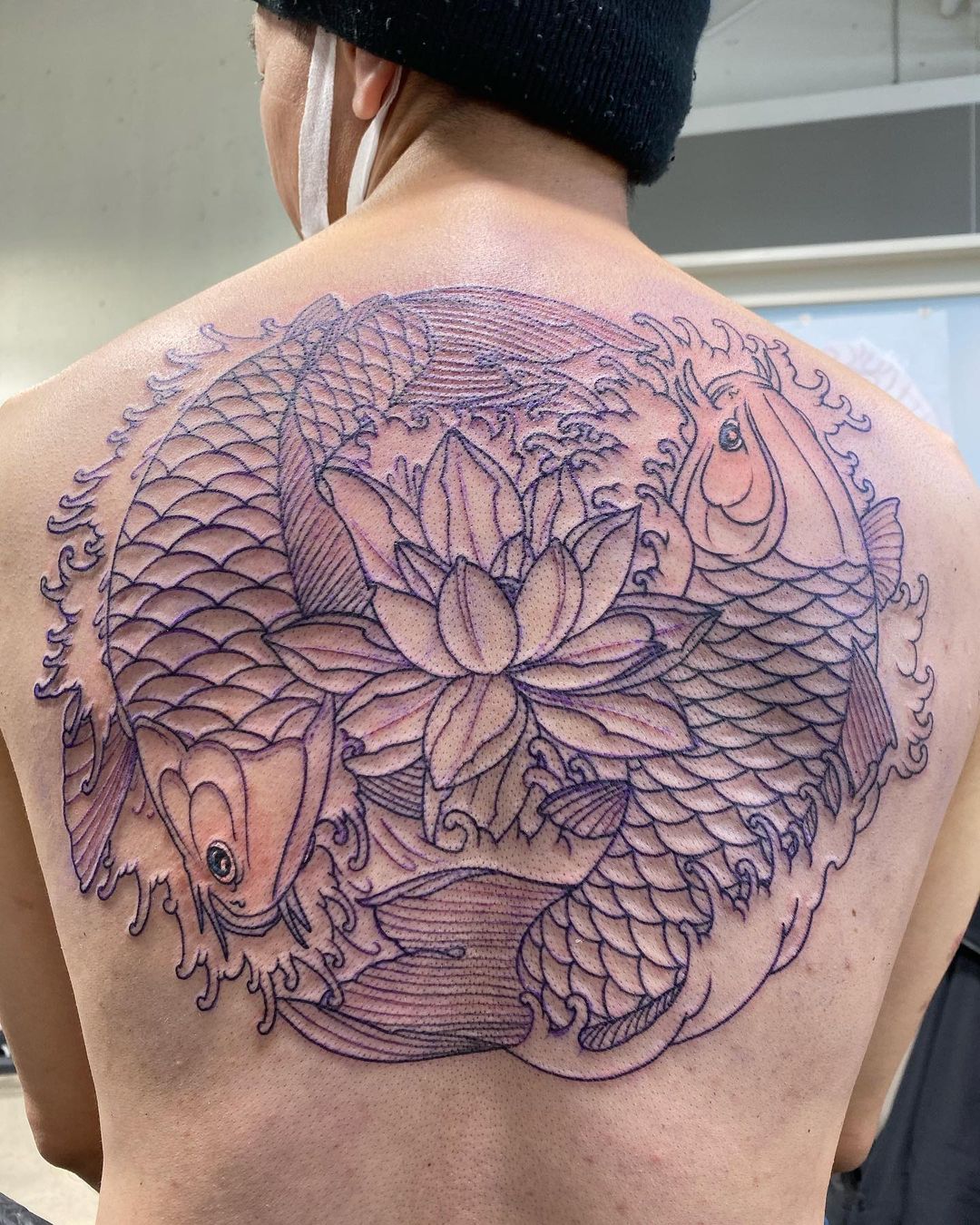 Huge Lotus Flower With Koifish Tattoo