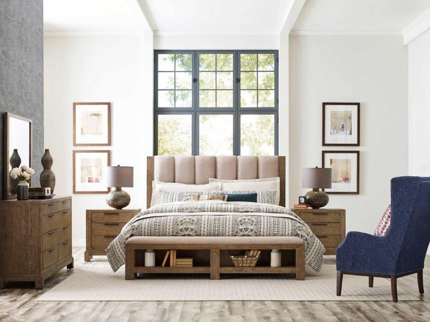 upholstered bed with wood furniture 