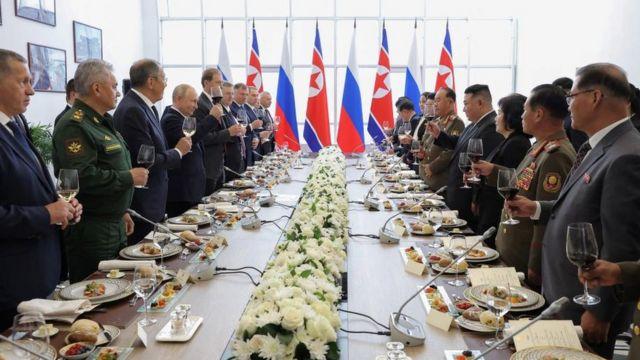 North Korean leader Kim Jong Un and Russia's President Vladimir Putin attend a banquet, in Russia, September 13, 2023 in this image released by North Korea's Korean Central News Agency.