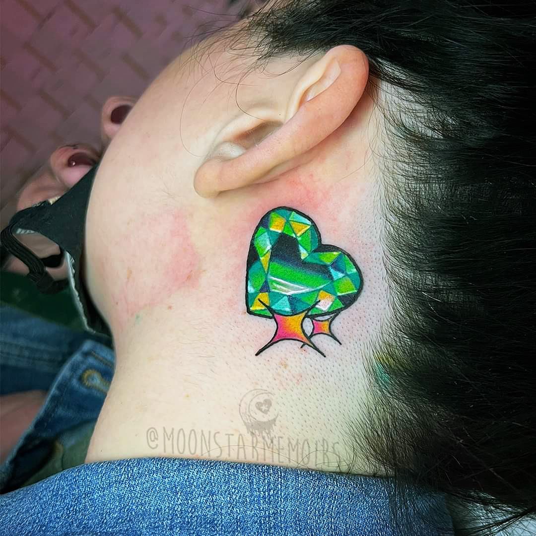 Colorful Heart Gem Behind The Ear Tattoo