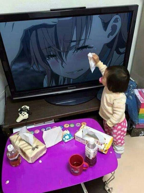 20. Father clicks his daughter photograph when she showing sympathy to a cartoon character
