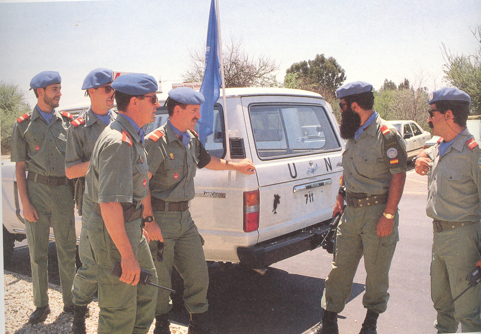 EZAPAC corporals deployed in Namibia in 1989 next to a Spanish UN white car.