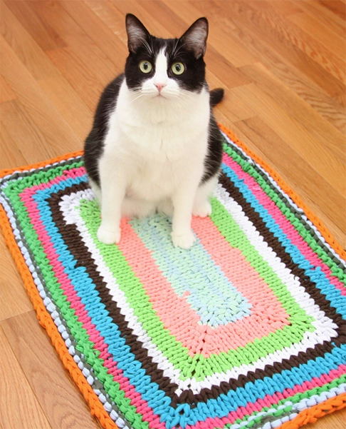 fun rug made with t-shirt yarn and knit from center out