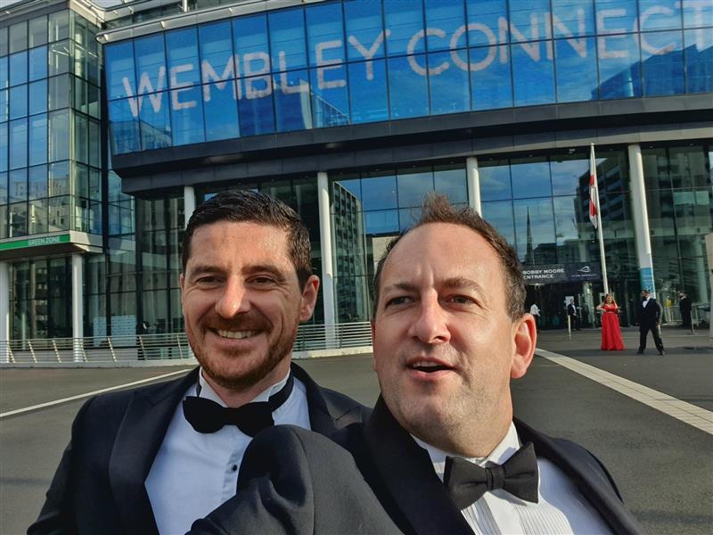 Ryan and Rob in their tux's in front of Wembley Stadium