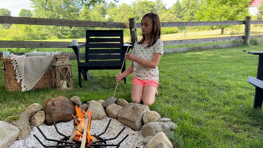 Girl roasting marshmallows
