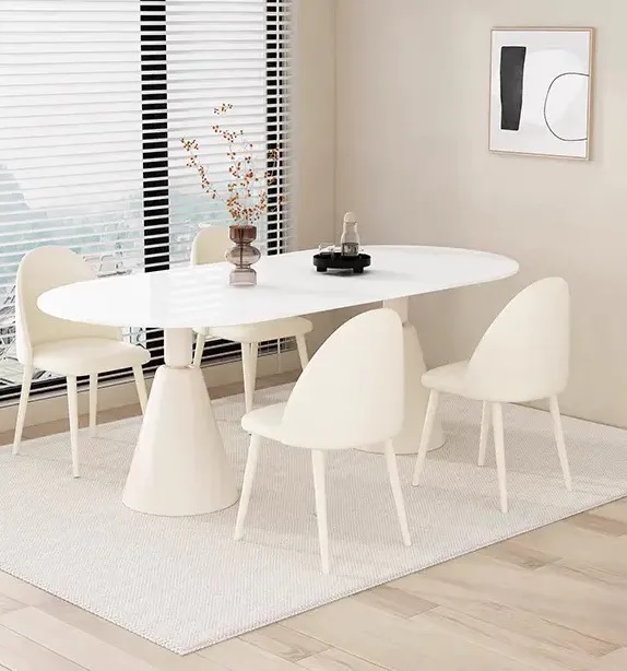 White oval sintered stone dining table with metal legs