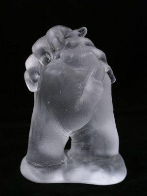 an example of one of our glass holding hands casts
