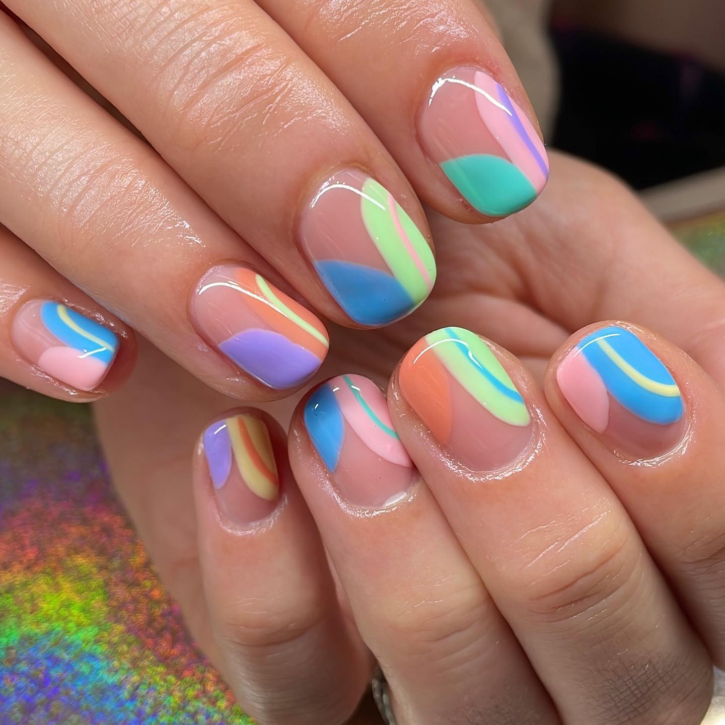 Fun pastel summer rainbow nails on short nails