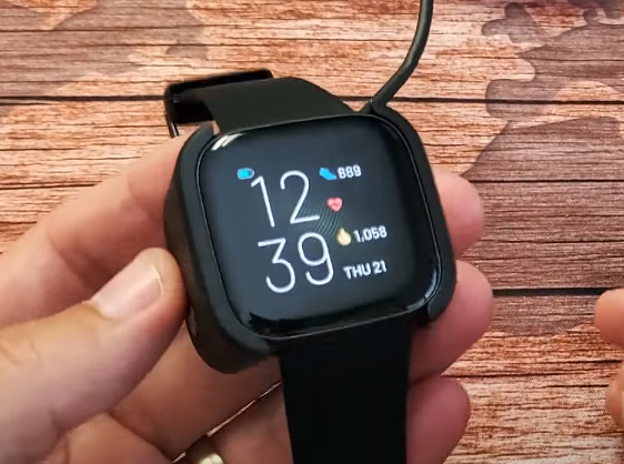 prop up your charger fitbit versa 2
