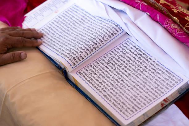 Guru Granth Sahib Holy Religious Scripture Stock Photo - Download Image Now  - Sikhism, Holy Book, India - iStock