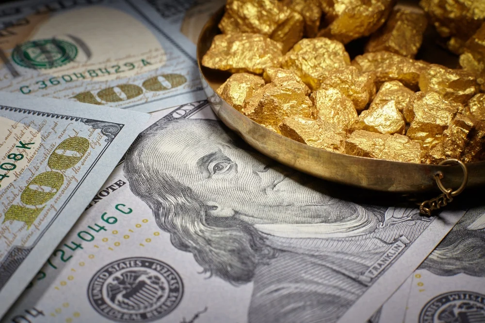 Billets de dollar avec or